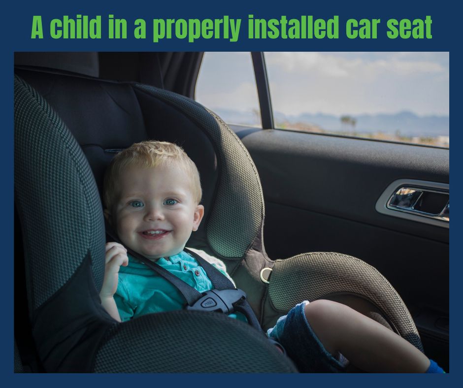 A child in a properly installed car seat