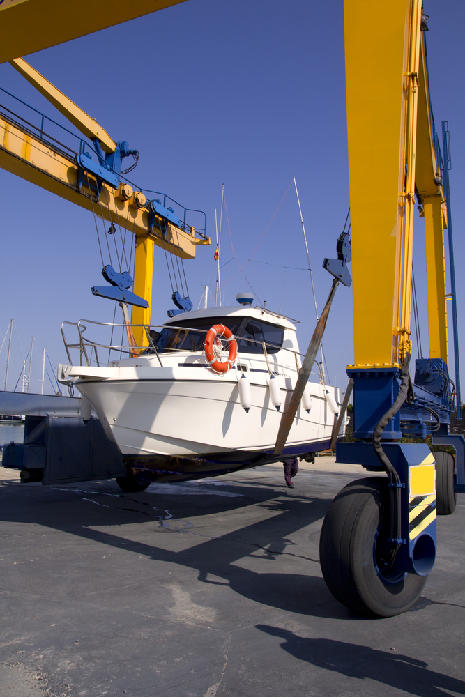 Boat,Yellow,Crane,Travelift,Lifting,Motorboat,For,Yearly,Antifouling,Hull